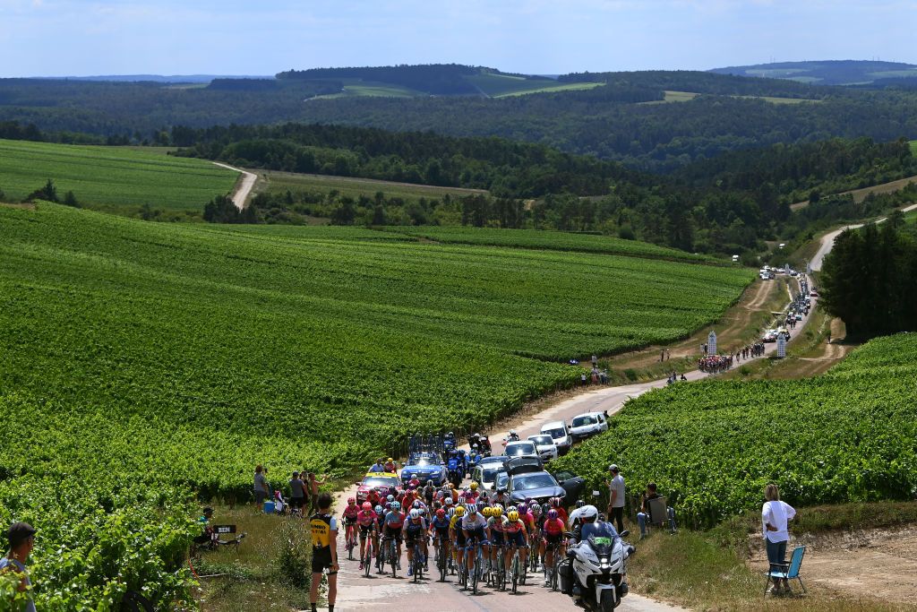 BARSURAUBE FRANCE JULY 27 A general view of Veronica Ewers of United States and Team EF Education Tibco Svb Elisa Longo Borghini of Italy and Team Trek Segafredo Ellen Van Dijk of Netherlands and Team Trek Segafredo Elise Chabbey of Switzerland and Team CanyonSRAM Racing Alena Amialiusik of Belarus and Team CanyonSRAM Racing Juliette Labous of France and Team DSM Women Cecilie Uttrup Ludwig of Denmark and Team Fdj Nouvelle Aquitaine Futuroscope Ashleigh Moolman Pasio of South Africa and Team SD Worx Liane Lippert of Germany and Team DSM Women and the peloton beginning to climb the Cte du Val des Clos 308m during the 1st Tour de France Femmes 2022 Stage 4 a 1268km stage from Troyes to BarSurAube TDFF UCIWWT on July 27 2022 in BarsurAube France Photo by Tim de WaeleGetty Images