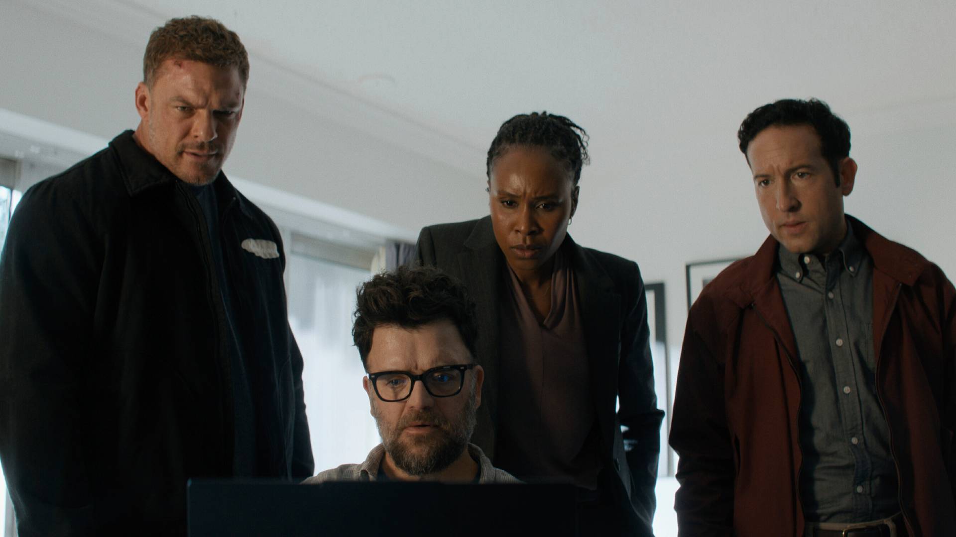 Alan Ritchson as Reacher, Kevin Corrigan as Shaun Docherty, Sydelle Noel as Tamara Green, and Christopher Marquette as Jacob Merrick in Reacher season 4