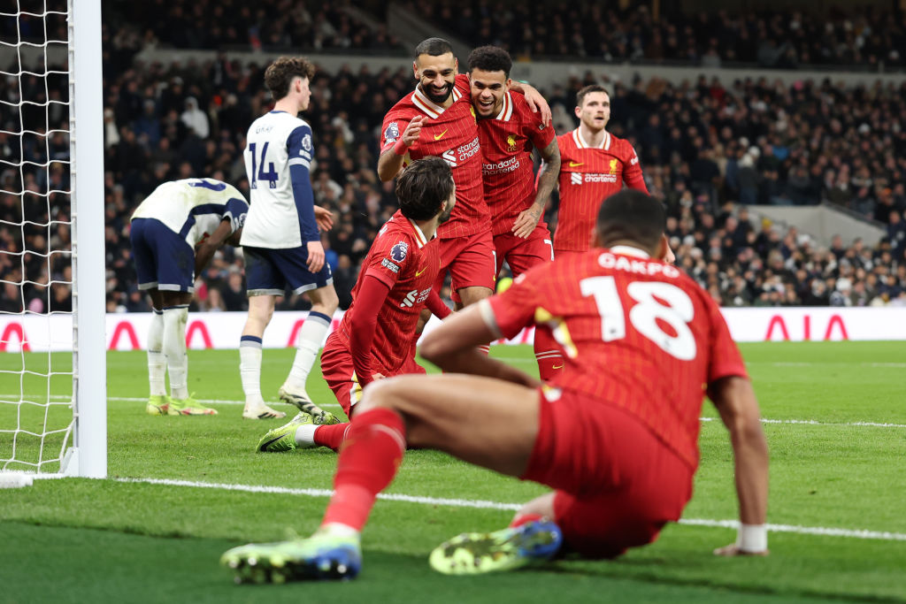 Mohamed Salah of Liverpool celebrates scoring his team&#039;s fourth goal with teammates Luis Diaz, Dominik Szoboszlai and Cody Gakpo during the Premier League match between Tottenham Hotspur FC and Liverpool FC at Tottenham Hotspur Stadium on December 22, 2024 in London, England.