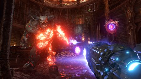 Best FPS games: A screenshot of the Doom Slayer shooting a Cyberdemon in the game Doom Eternal.