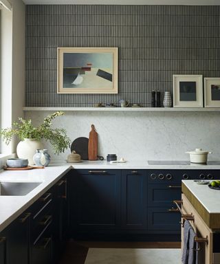 Kitchen with navy blue and tiles