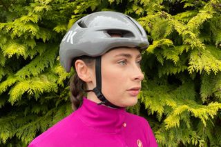 Female cyclist wearing the Kask Utopia Y bike helmet