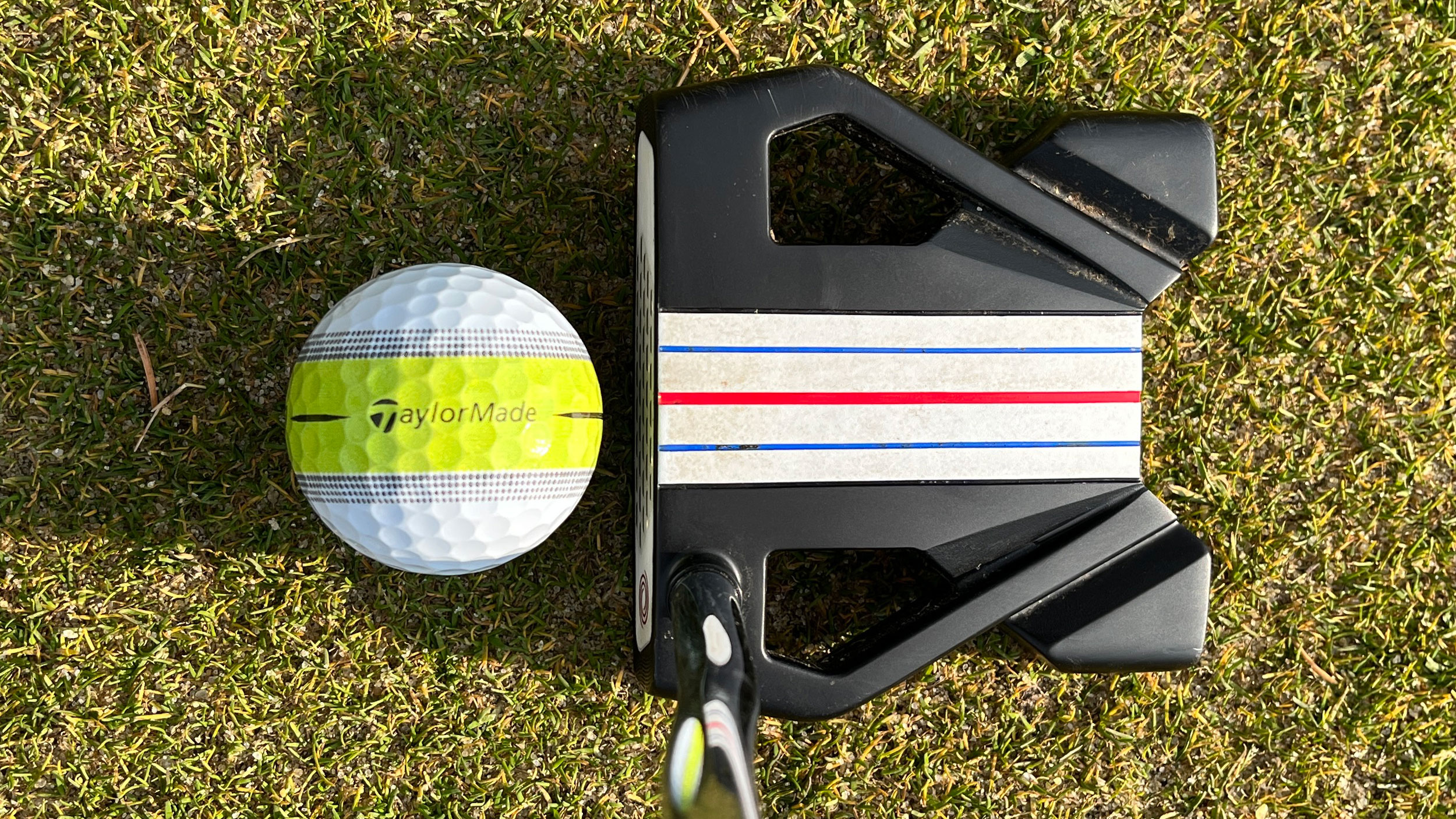 taylormade stripe golf ball with putter