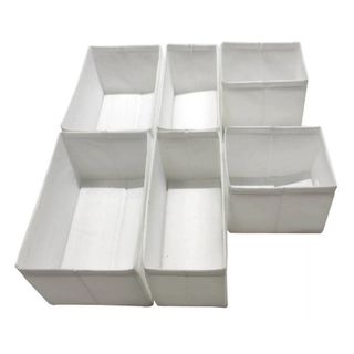 A set of white fabric rectangular drawer dividers