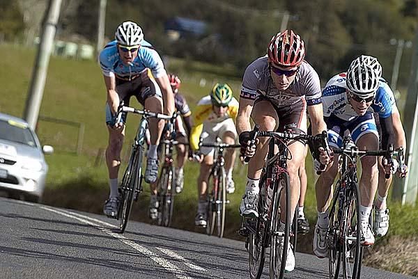 The lead group with Phil Zajicek (left) of Fly V Australia and Jai Crawford (Savings and Loans) driving as they near the final 20 kilometres of the stage.