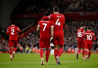Luis Diaz of Liverpool celebrates after scoring the third goal during the Premier League match between Liverpool FC and Luton Town at Anfield on February 21, 2024 in Liverpool, England.