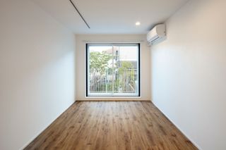 living space in Music Hall & Residential units by Ryuichi Sasaki Architecture