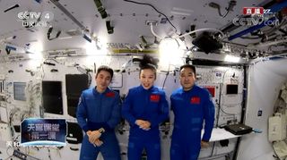  The Shenzhou 13 astronauts during a real-time Q&A with students.