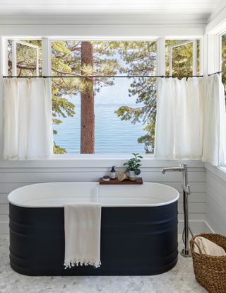 coastal bathroom with steel bath