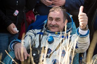 Thumbs Up! Expedition 36 Commander Exits Soyuz