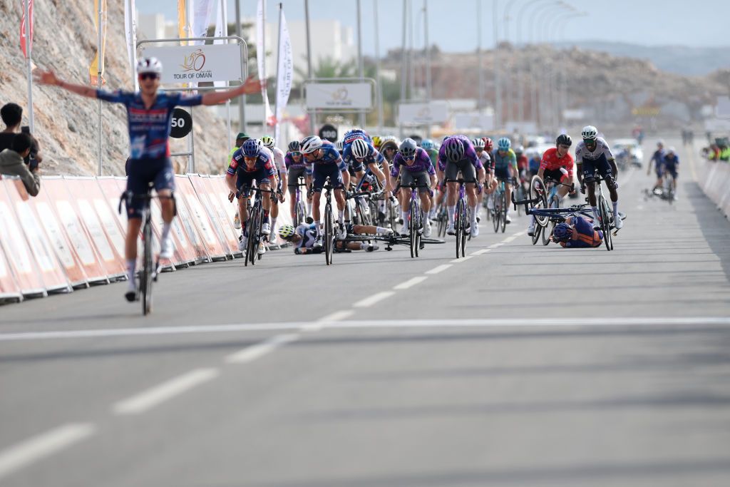 YITTI HILLS OMAN FEBRUARY 09 The peloton crashes sprinting at finish line during the 14th Tour of Oman Stage 2 a 2029km stage from Al Rustaq Fort to Yitti Hills 146m on February 09 2025 in Yitti Hills Oman Photo by Alex BroadwayGetty Images