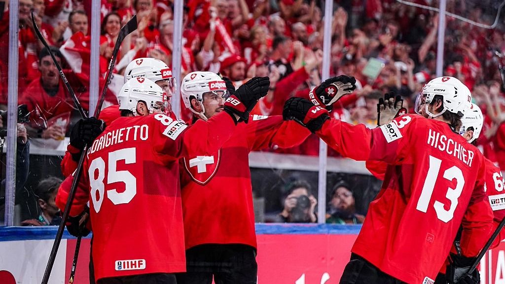 Ice hockey players in action during the IIHF World Championship tournament.