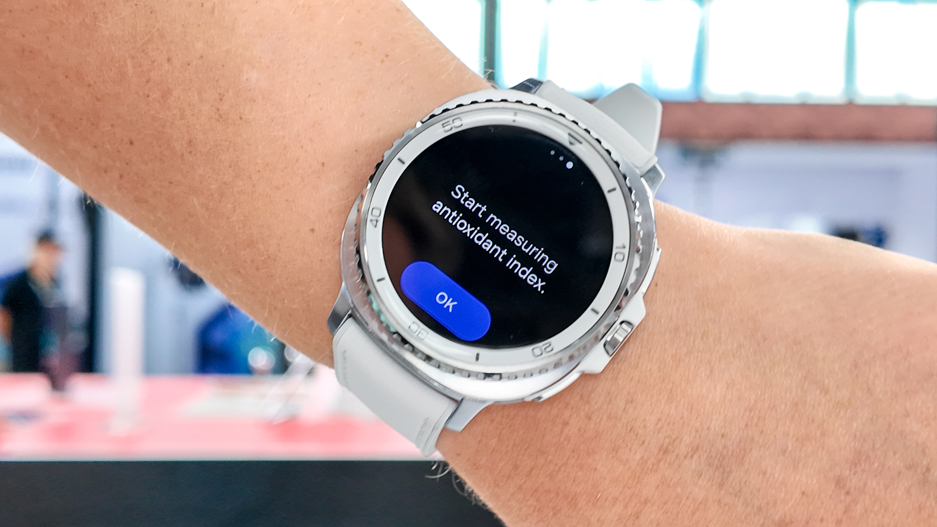 Close-up of the Samsung Galaxy Watch 8 Classic on the writer's wrist showing the new antioxidant measuring feature