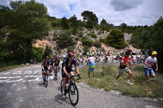 Team Ineos riders lead the pack during the 11th stage of the 108th edition of the Tour de France cycling race 198 km between Sorgues and Malaucene on July 07 2021 Photo by AnneChristine POUJOULAT AFP Photo by ANNECHRISTINE POUJOULATAFP via Getty Images