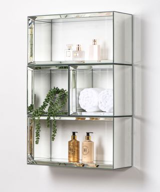 A modular mirrored shower shelf by MY FURNITURE