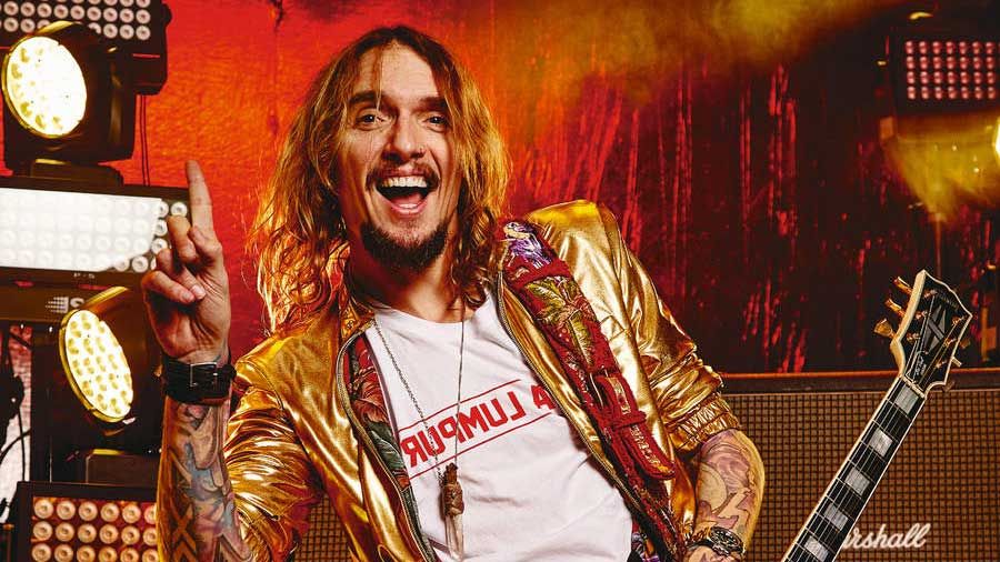 Justin Hawkins is thinking about buying a castle for The Darkness to