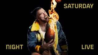 travis kelce lights a cigar over a flaming football in a portrait from when he hosted saturday night live