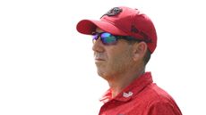 Sergio Garcia from the shoulders up, wearing a red polo, red cap and sunglasses