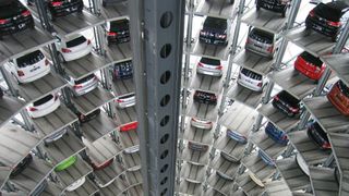 Cars parked in a cylindrical parking space