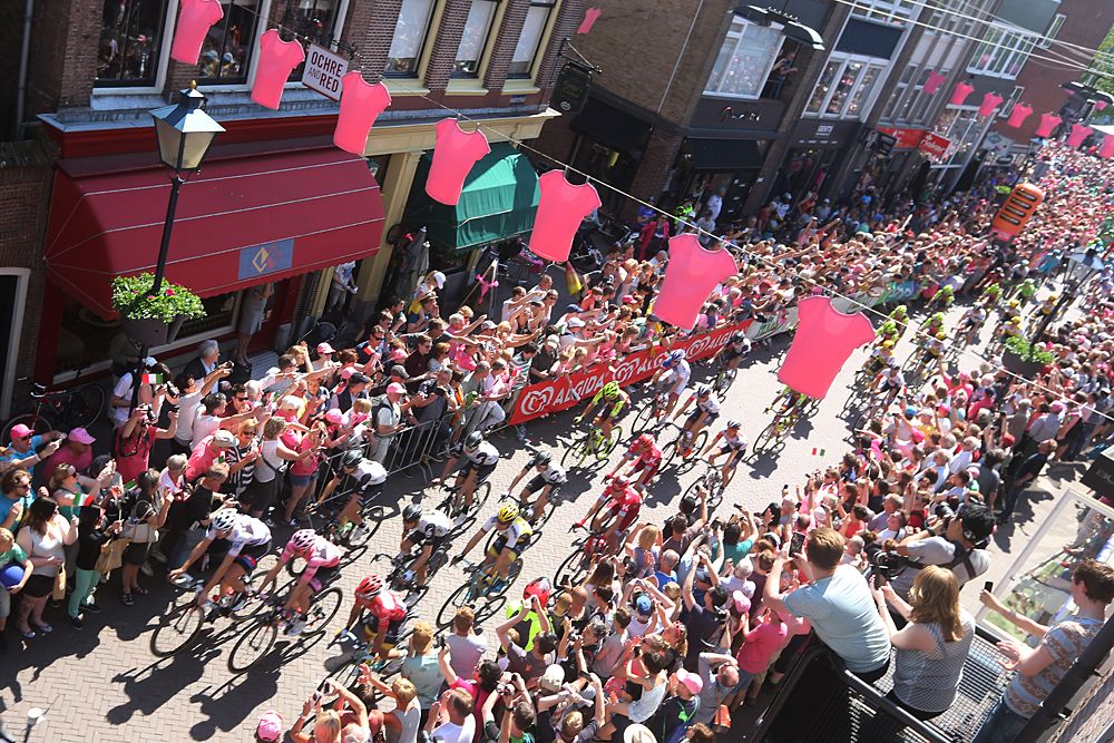 Pink jerseys strung across the road ways at the start of the Giro d'Italia stage 2 in Arnhem
