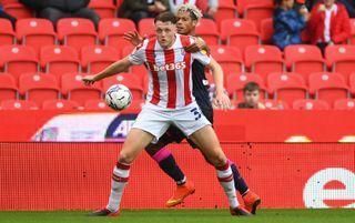 Stoke City defender Harry Souttar shielding the ball