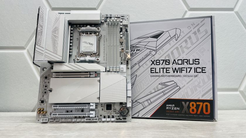 Gigabyte&#039;s X870 Aorus Elite WiFi7 Ice motherboard on a light desk with white background.