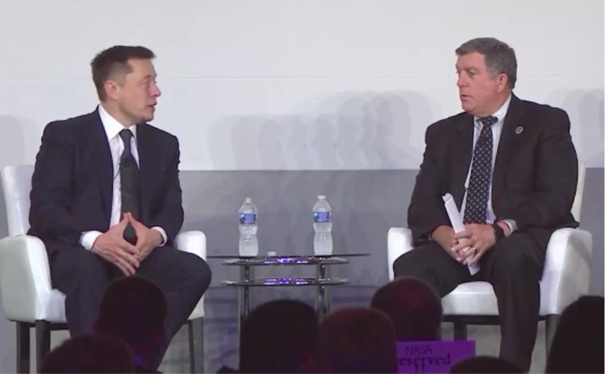 Elon Musk (left) talks to NASA International Space Station (ISS) program manager Kirk Shireman on July 19, 2017, at the ISS Research and Development conference in Washington, D.C.