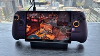 MSI Claw 8 EX AI+ handheld gaming console on a stand showing a LEGO video game scene.