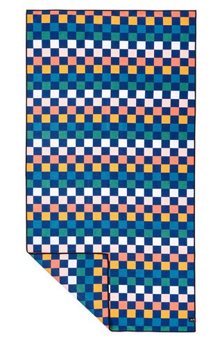 a checkered beach towel in blue, green, orange, yellow, and white