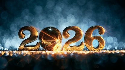 2026 in sparkling gold against a textured blue background.