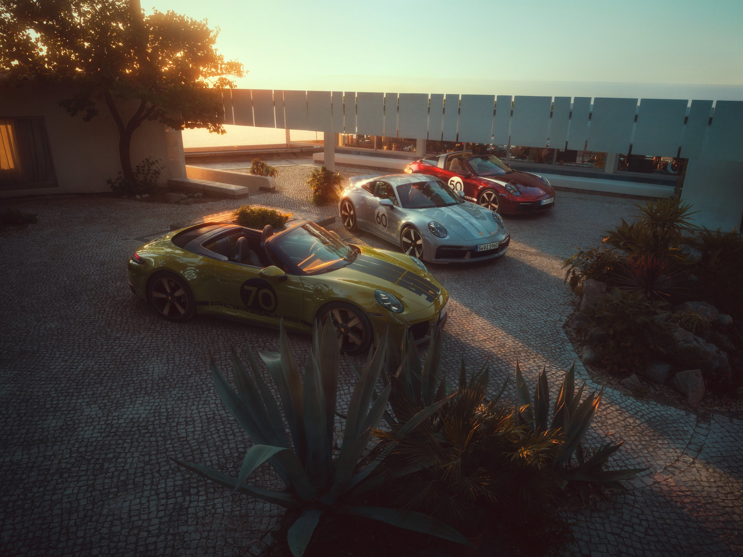 Porsche 911 Spirit 70 shown alongside the two earlier Heritage Design cars