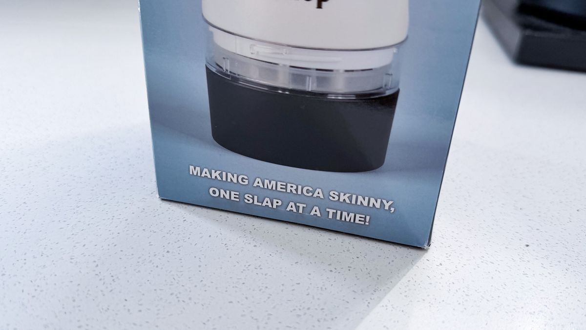 The box of the Slap Chop showing its tagline