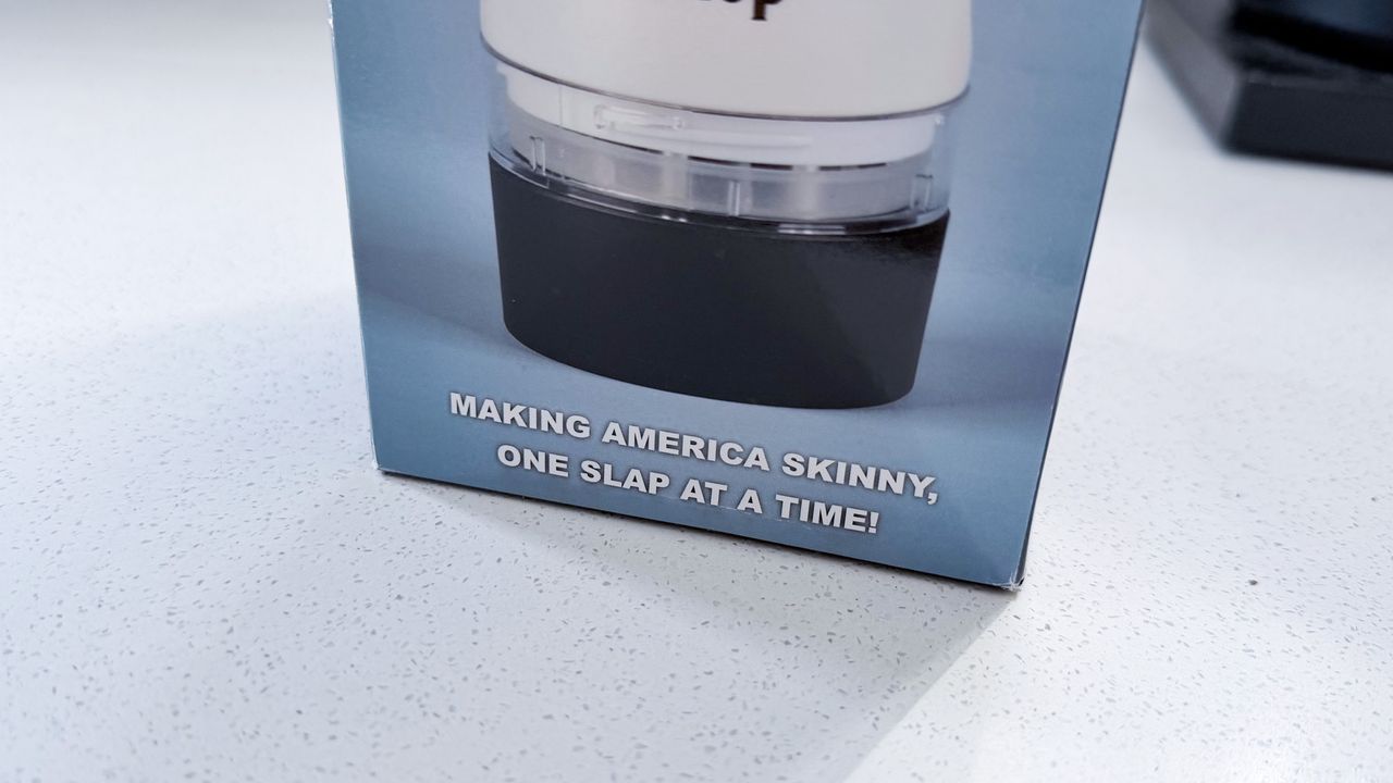 The box of the Slap Chop showing its tagline