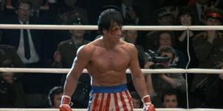 Rocky IV Sylvester Stallone stands in the ring, a little beaten up