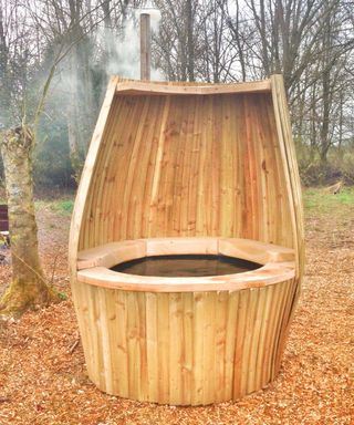 wooden hot tub with built-in shelter