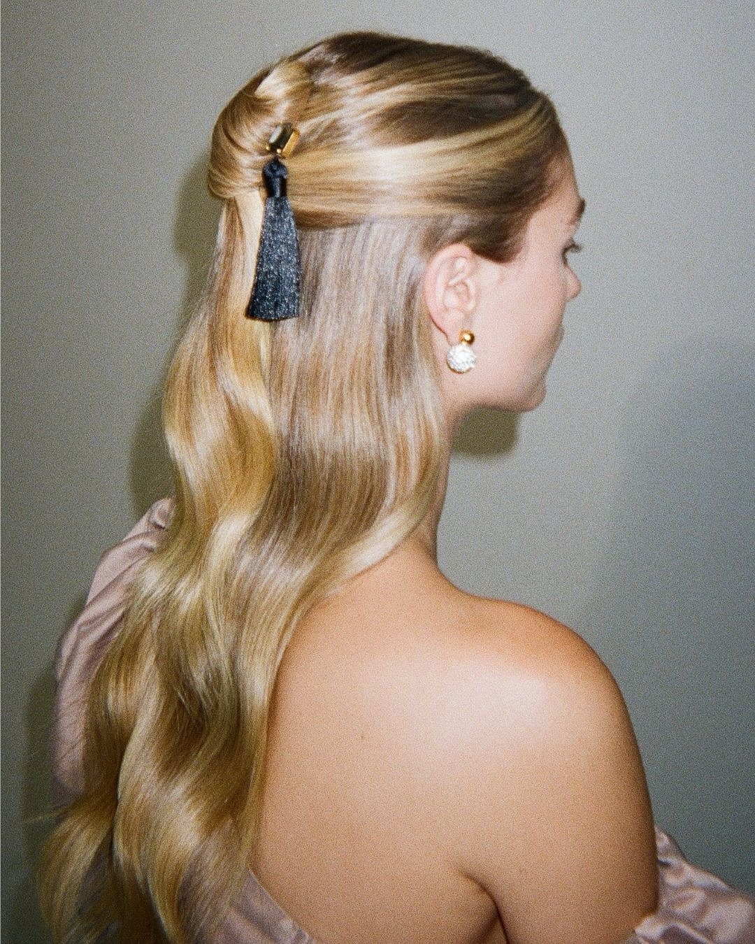 Photo of a woman wearing hair tassels