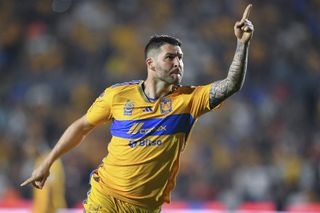 Andre-Pierre Gignac celebrates a goal for Tigres against Necaxa in April 2024.