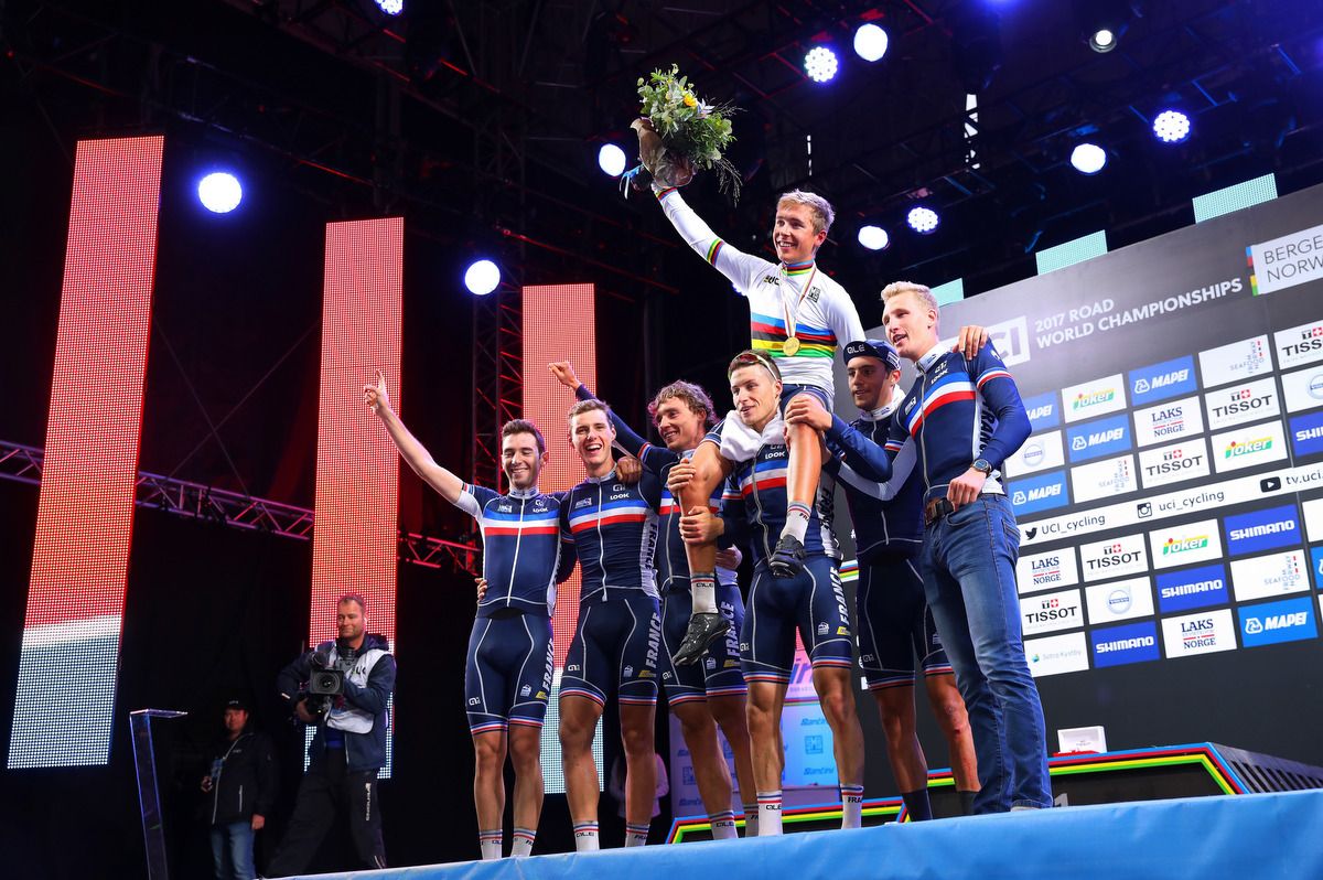 The French team celebrate Benoit Cosnefroy's win