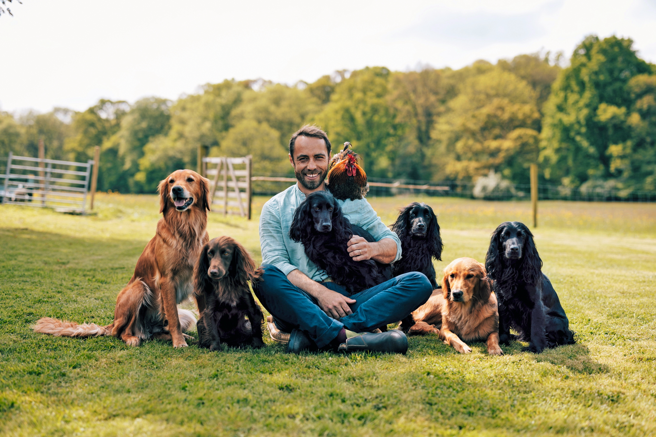 James Middleton with his dogs (from left) Mabel, Nala, Inka, Zulu, Isla, Luna and Peter the chicken