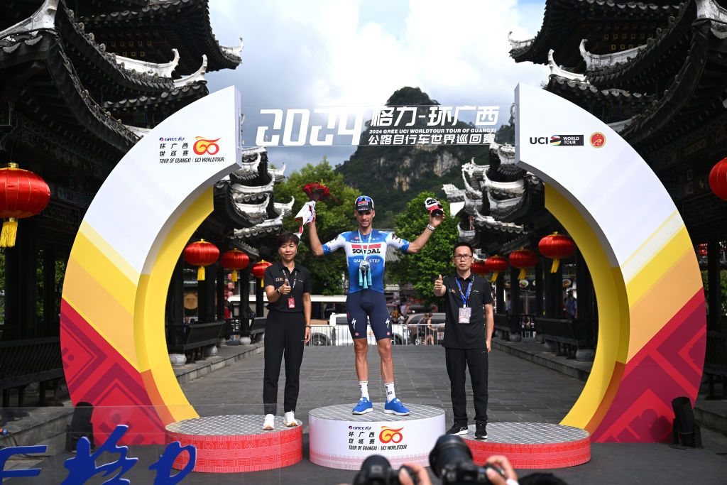 JINGXI CHINA OCTOBER 16 Warre Vangheluwe of Belgium and Team Soudal QuickStep celebrates at podium as stage winner during the 5th GreeTour Of Guangxi 2024 Stage 2 a 1815km stage from Chongzuo to Jingxi 741m UCIWT on October 16 2024 in Chongzuo China Photo by Dario BelingheriGetty Images
