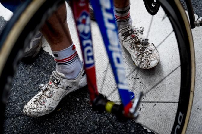 A pair of muddy shoes after the race