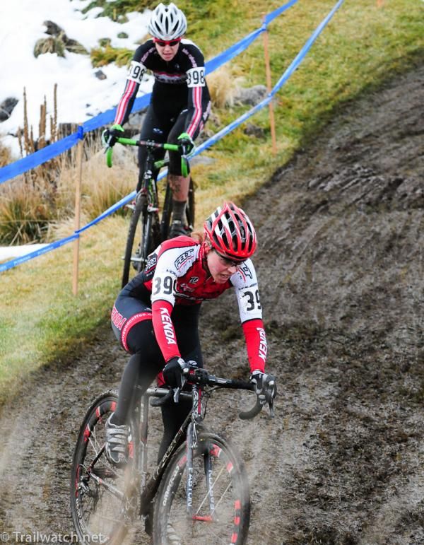Amanda Carey leading Devon Haskell as they approach the steps