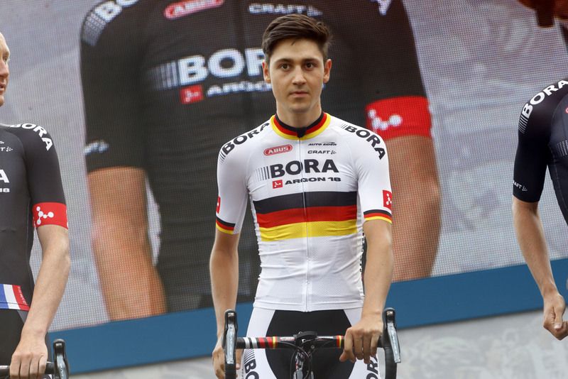 Emanuel Buchmann shows off his national German champion jersey