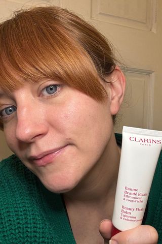 a headshot of matilda wearing clarins flash balm