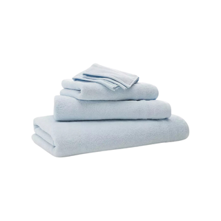 A stack of baby blue towels