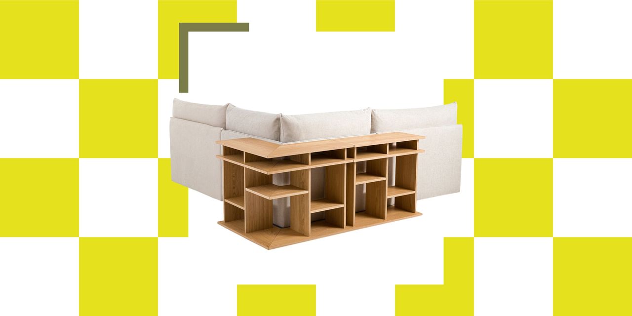 corner sofa with storage shelves behind it