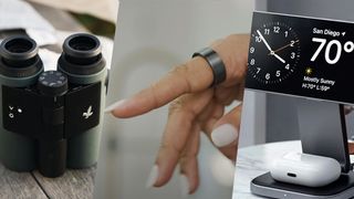 A pair of binoculars, hand with a smart ring and iPhone stand