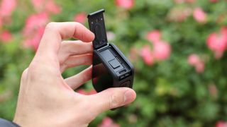 GoPro HERO13 Black action camera held in a hand