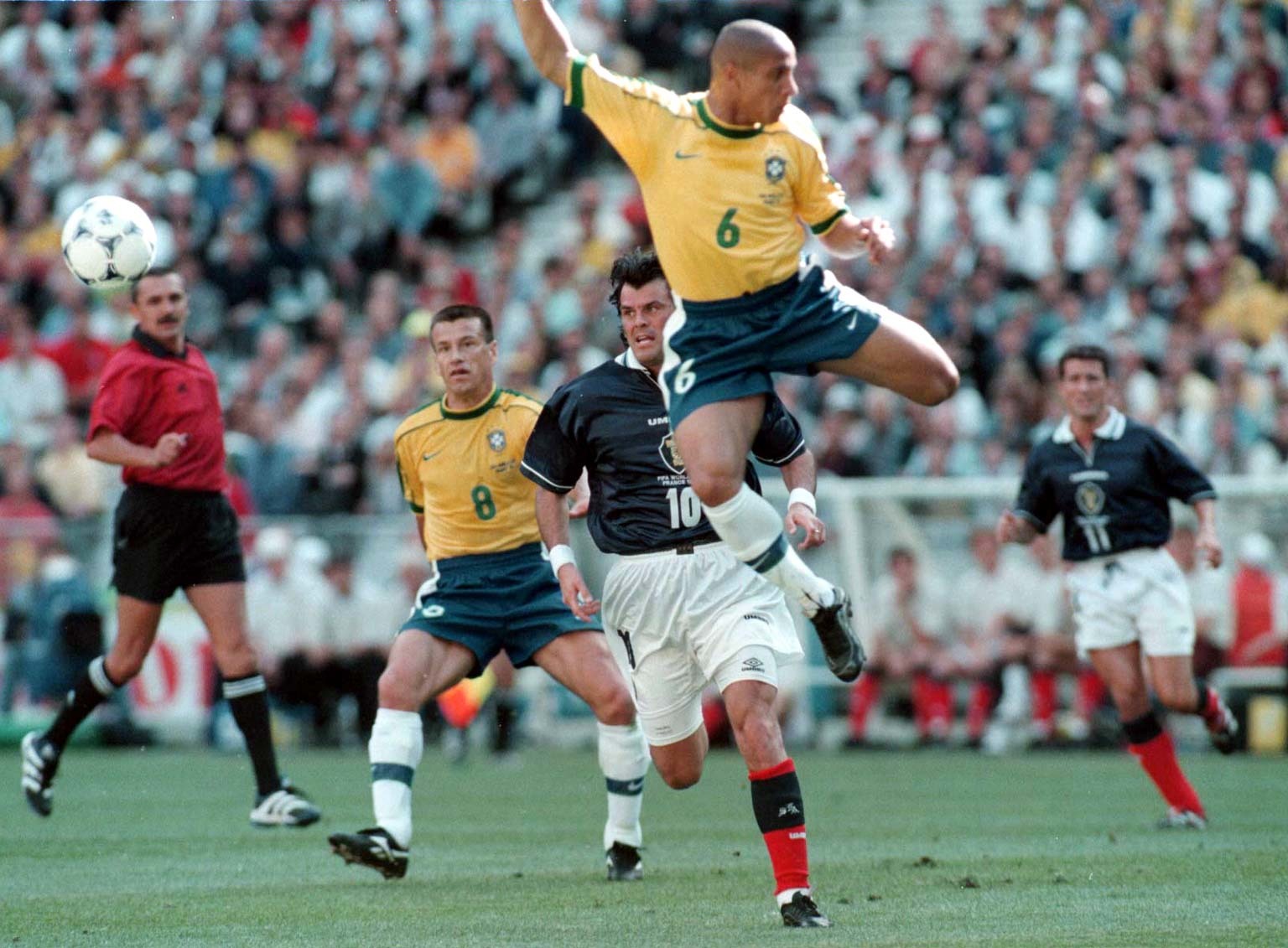 Brazilian Roberto Carlos (centre) admits he does not know how he scored his banana-shot free-kick (Owen Humphreys/PA)