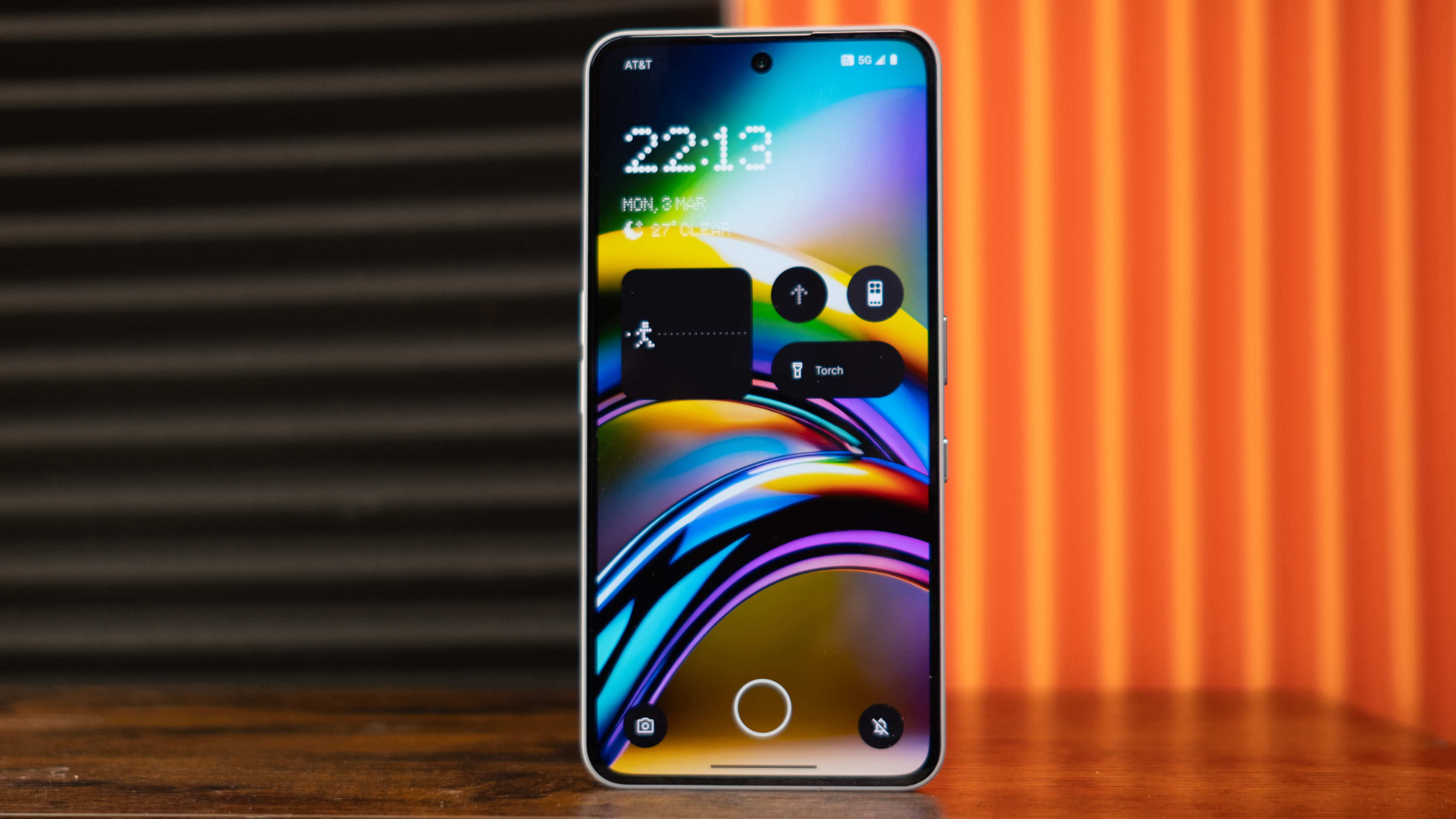 Nothing Phone (3a) Pro front showing lock screen with AI wallpaper